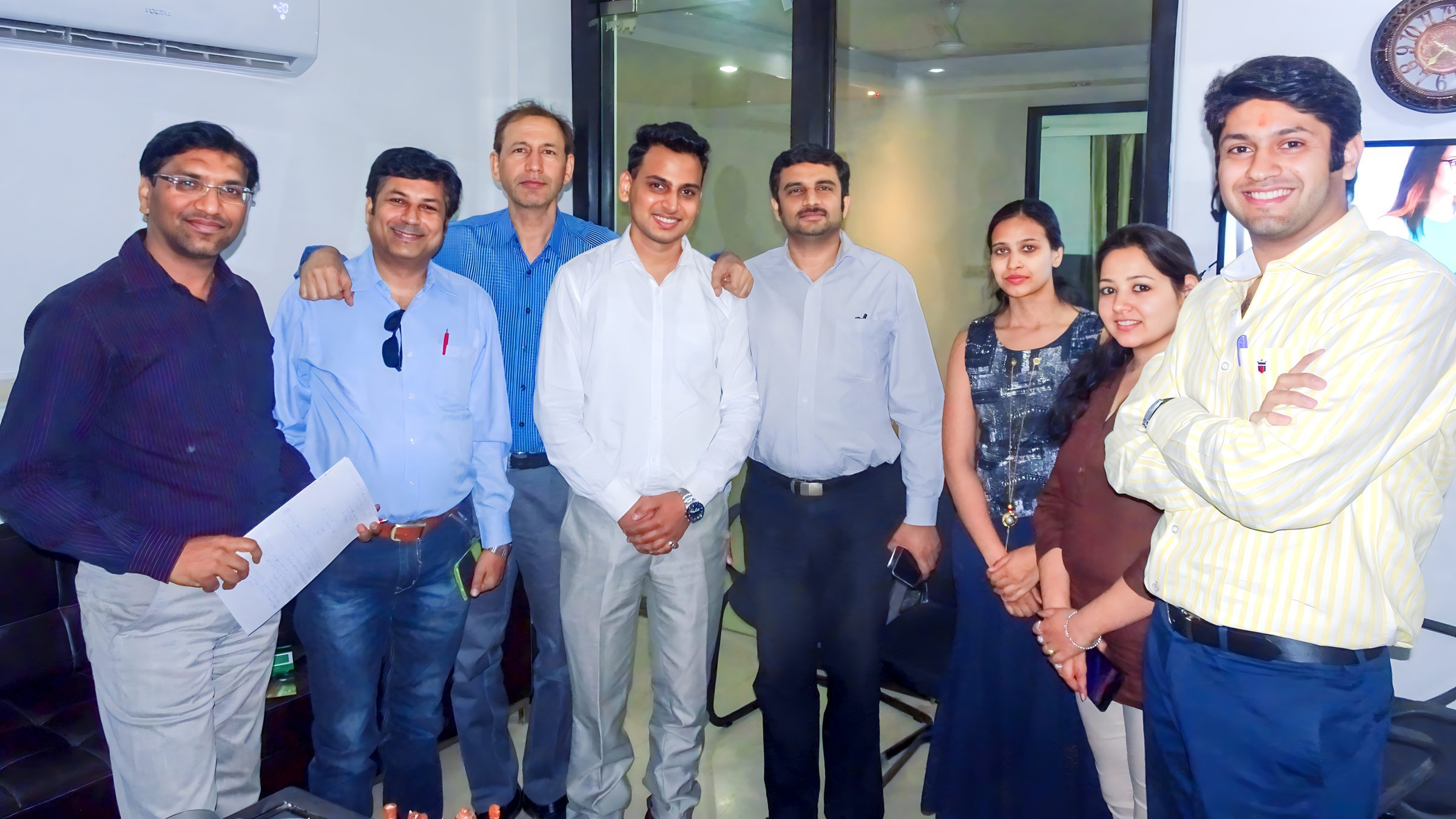 Lithvik Mukesh Sharma is photographed with CryptoMize business developers