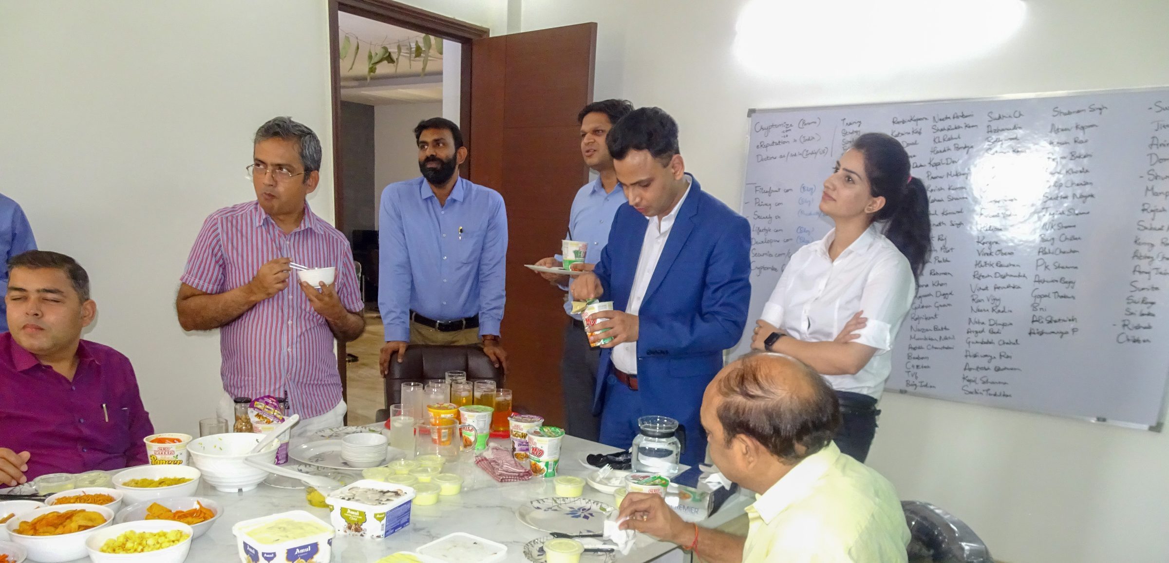 Lithvik Mukesh Sharma is photographed with CryptoMize business associates