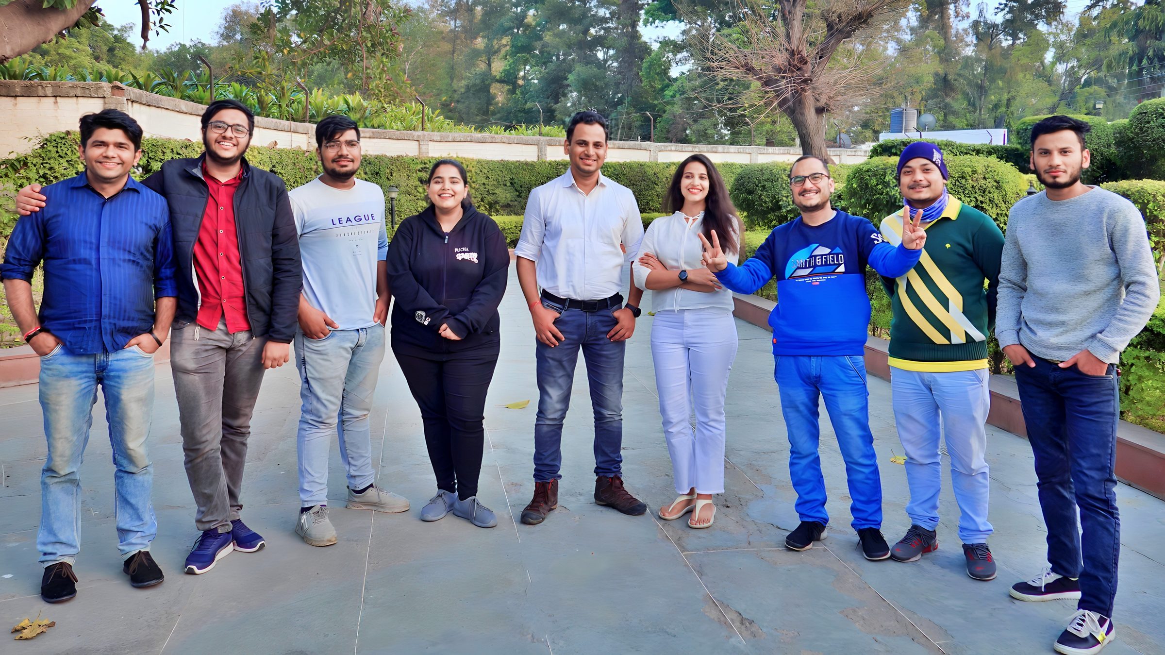 Lithvik Mukesh Sharma is photographed with Dr. Jyoti Kush and the CryptoMize ground team