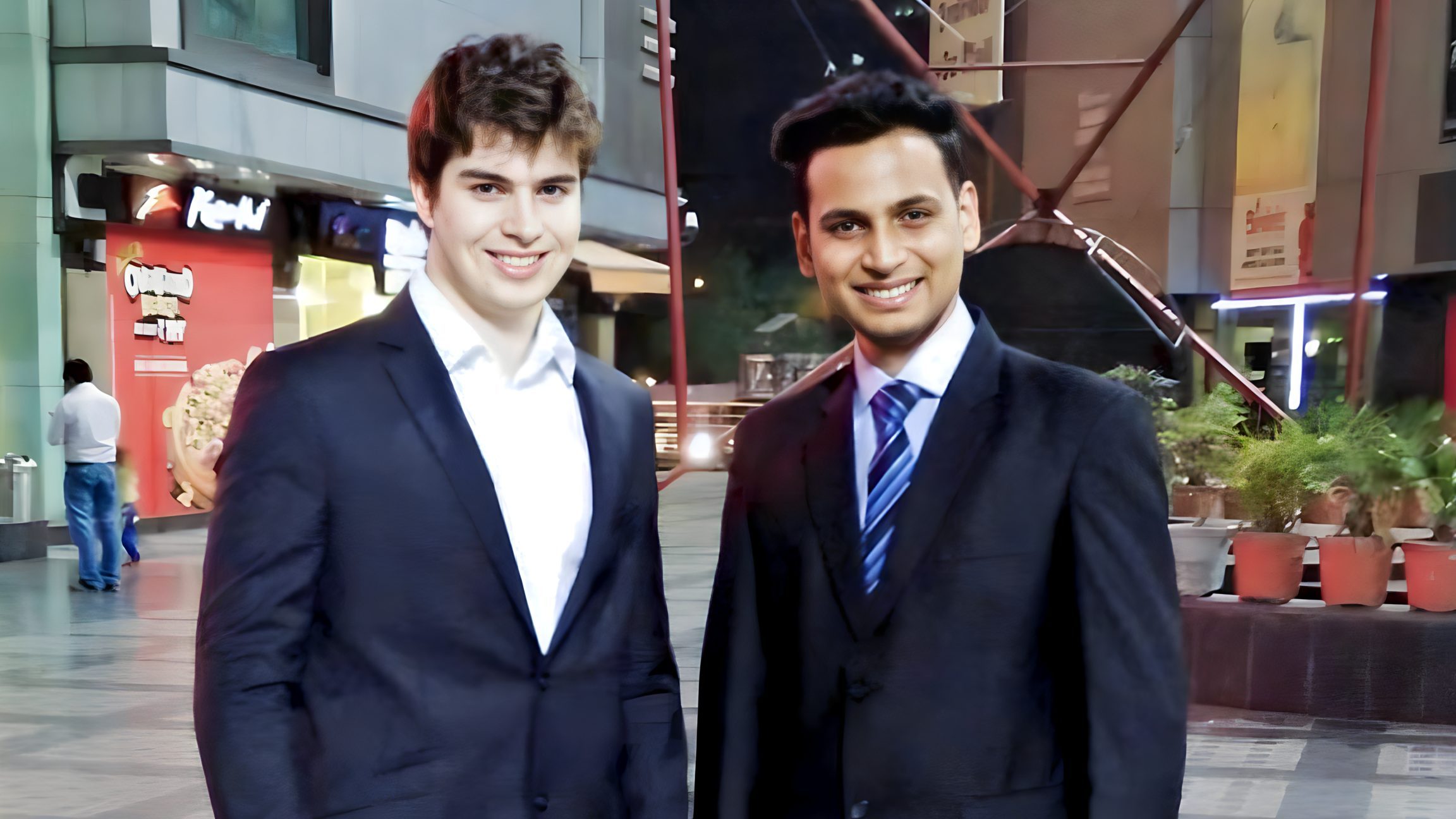 Lithvik Mukesh Sharma is photographed with a French intern at a hosted gathering Lithvik Mukesh Sharma is photographed with a French intern at a hosted gathering