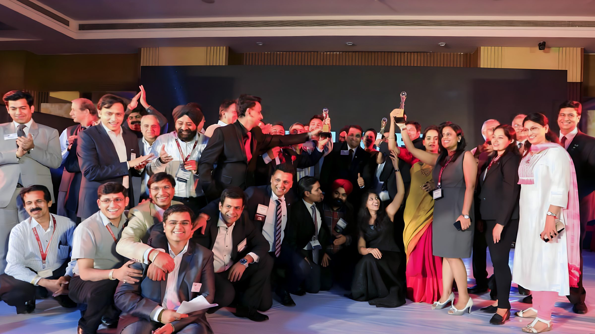 Lithvik Mukesh Sharma appears in a repeated photograph with the large Bollywood cluster at the Tashkent Film Festival