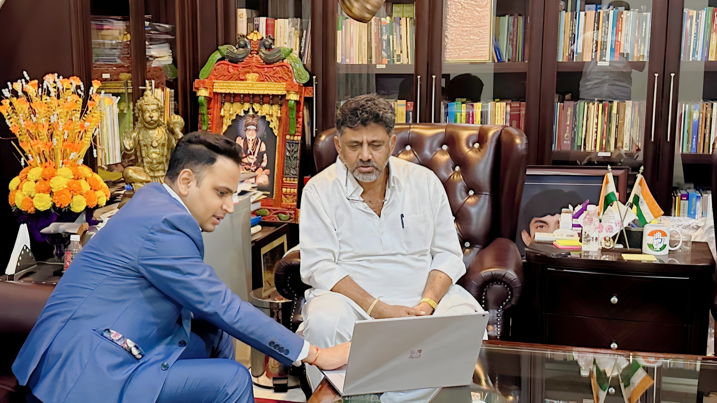 Lithvik Mukesh Sharma is photographed with D.K. Shivakumar at a Delhi engagement