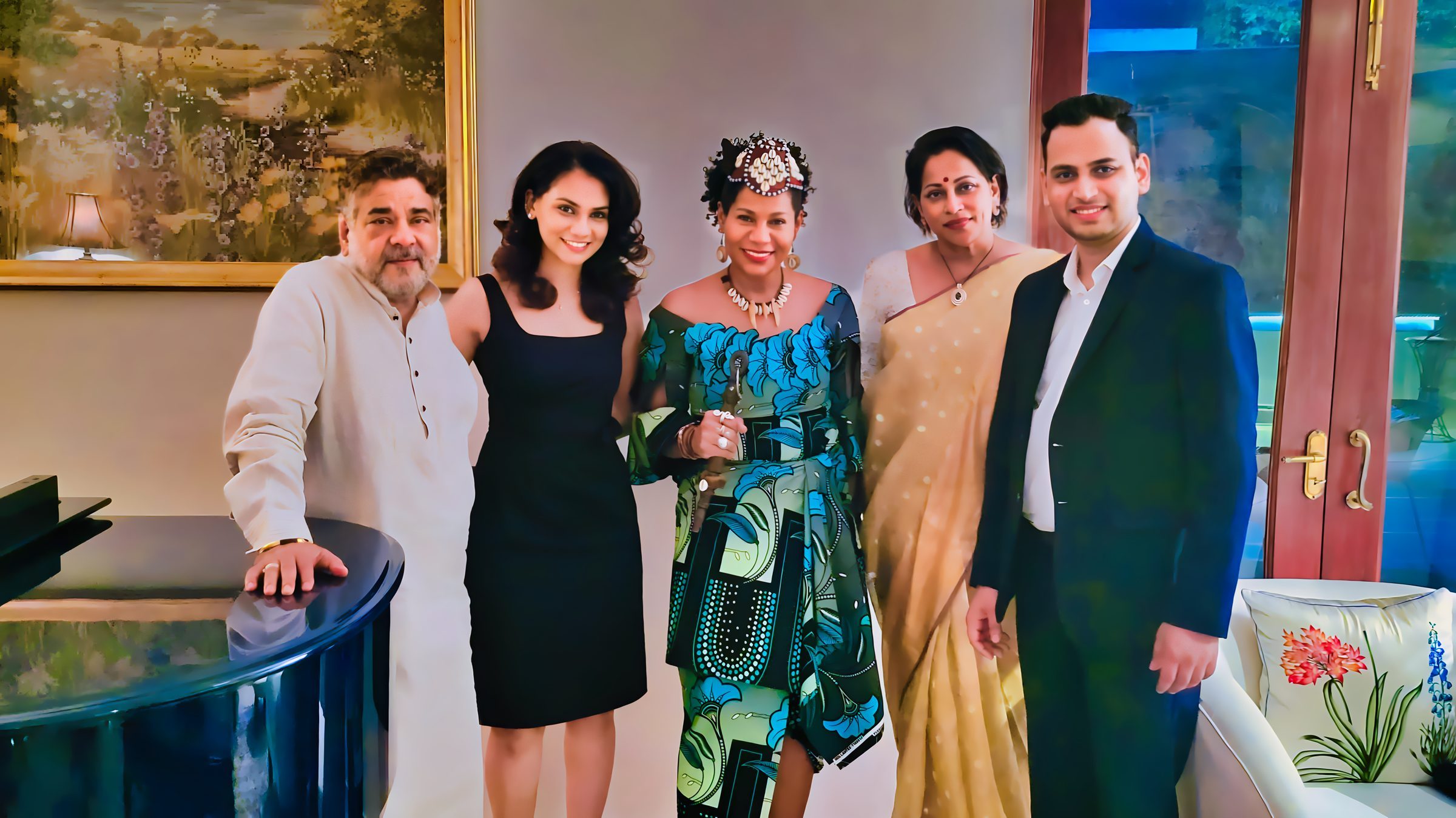 Lithvik Mukesh Sharma hosts Brian Silas, Tanvi Shah, and Queen Diambi at a hosted gathering