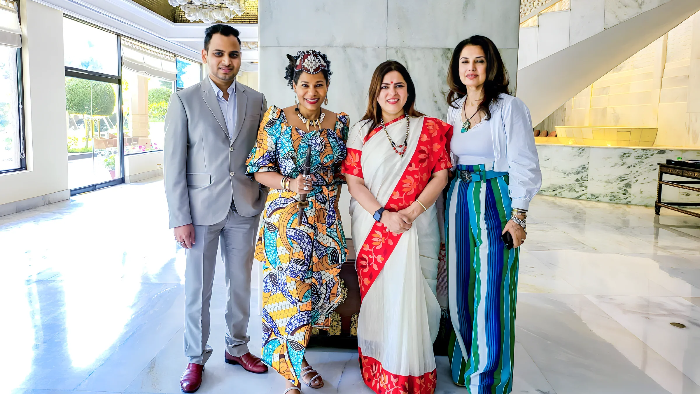 Lithvik Mukesh Sharma is photographed with Queen Diambi, Meenakshi Lekhi, and Ritu Beri at the Taj.