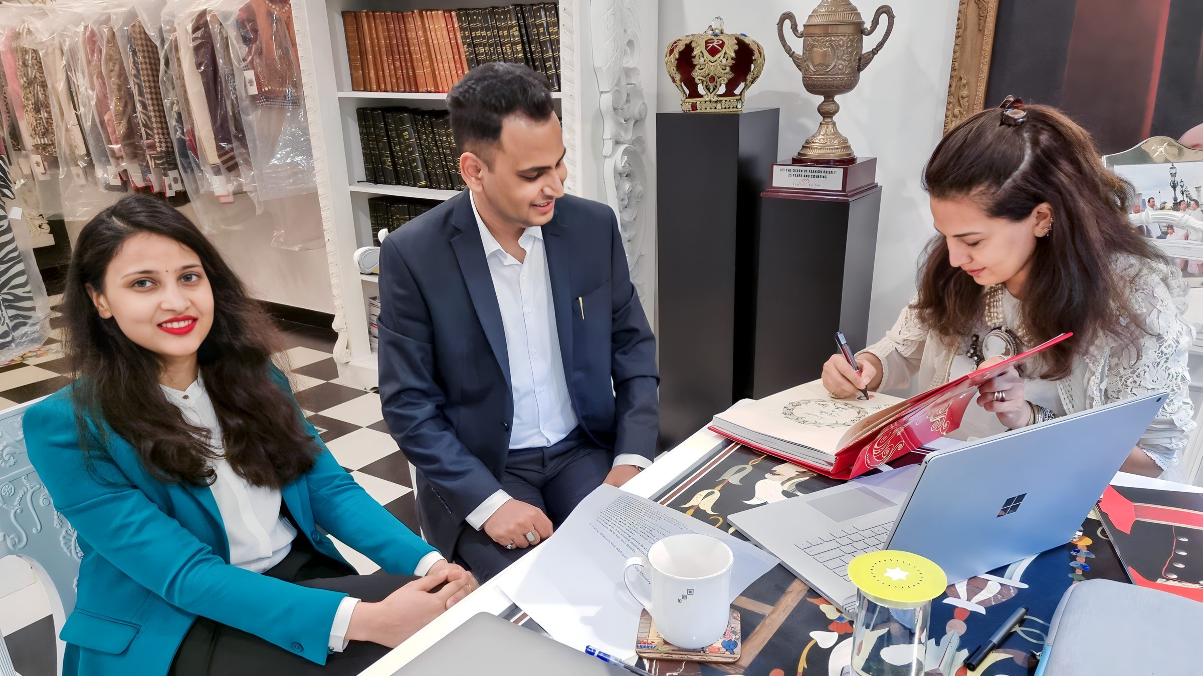 Lithvik Mukesh Sharma is photographed with Dr. Jyoti Kush and Ritu Beri