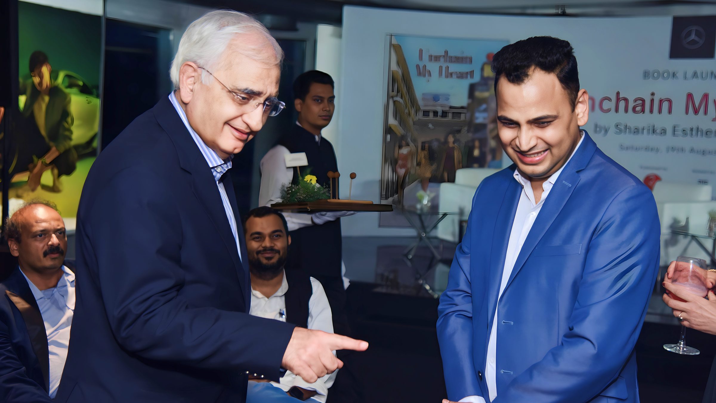 Lithvik Mukesh Sharma is photographed with Salman Khurshid at a book launch event