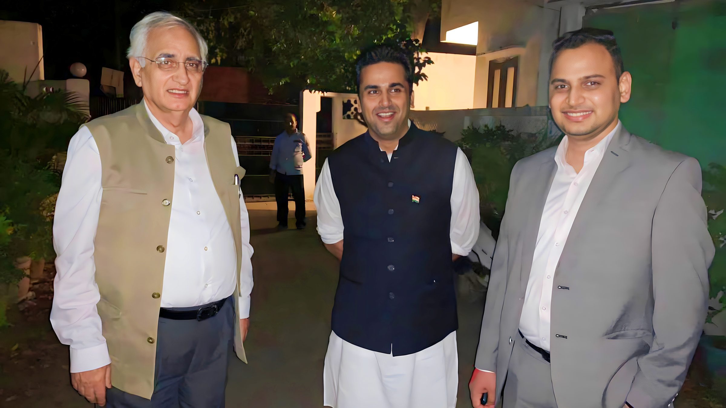 Lithvik Mukesh Sharma is photographed with Salman Khurshid and Faisal Patel at a Delhi event