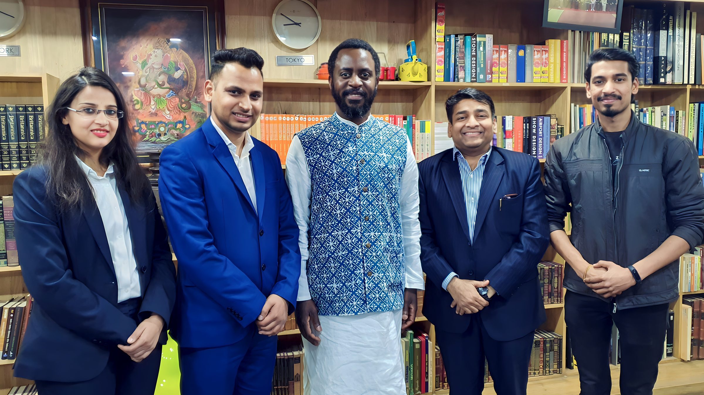 Lithvik Mukesh Sharma is photographed with Dr. Saviour Chishimba at a hosted gathering