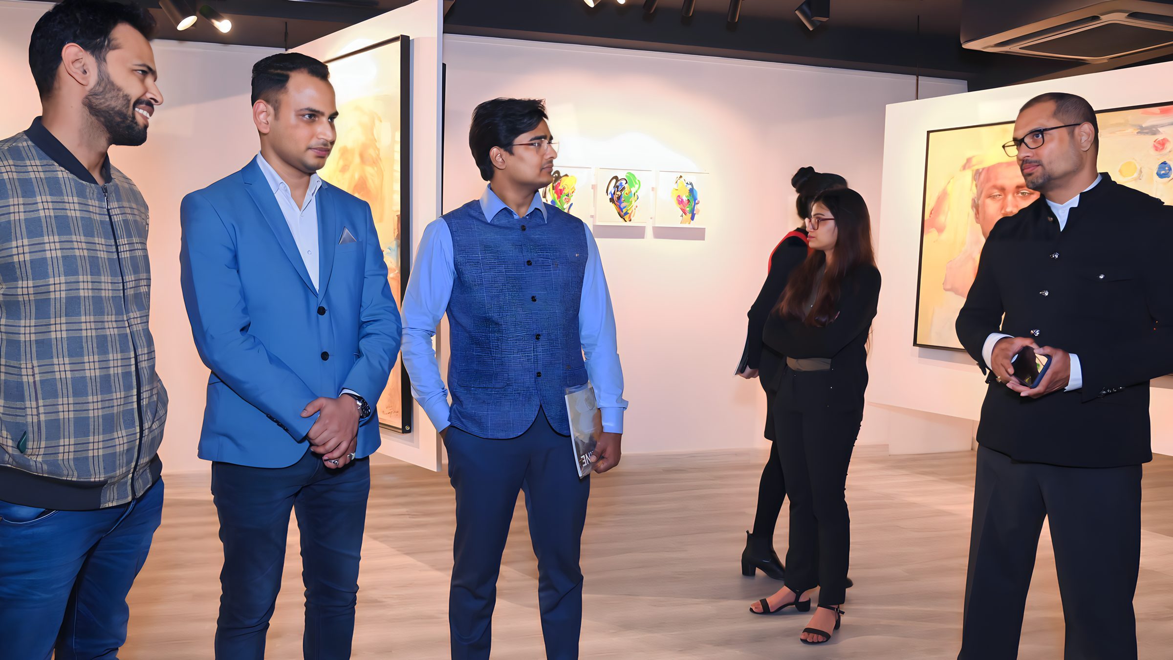 Lithvik Mukesh Sharma is photographed with Subrat Nath, Kapil Madan, and Sumer Raj Chadha at an art event