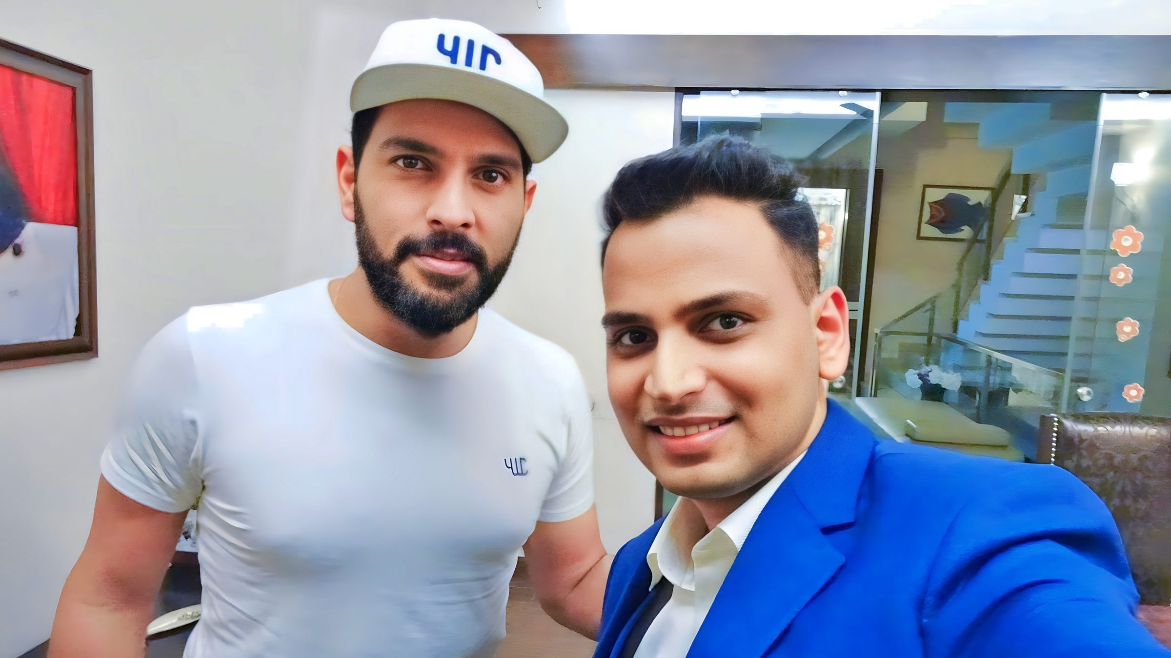 Lithvik Mukesh Sharma is photographed with Yuvraj Singh at a hosted gathering